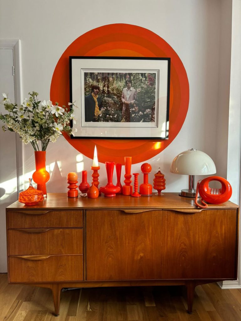 vintage cabinet, candles and picture